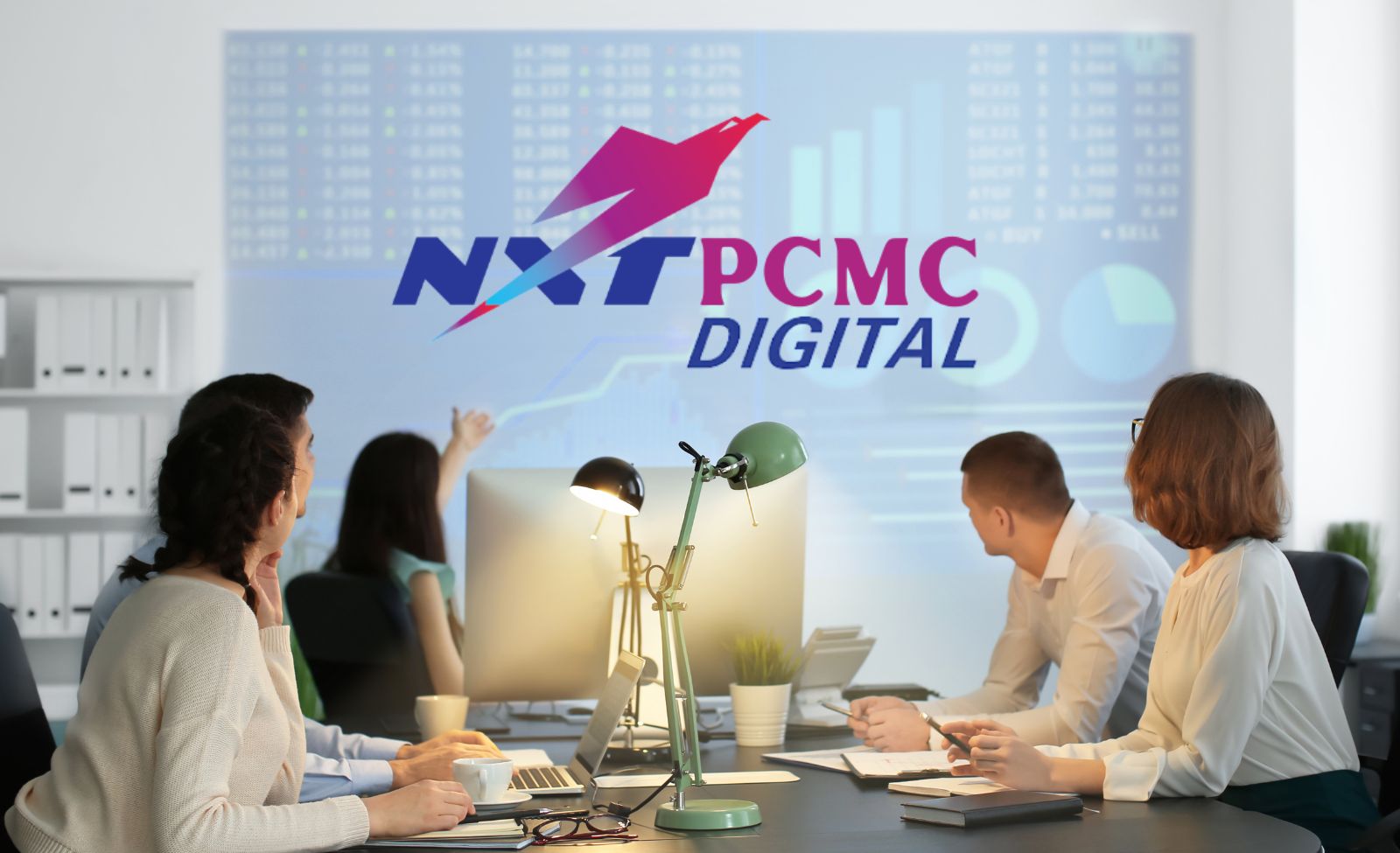 NXT PCMC logo